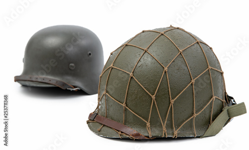 U.S and German World War Two military helmets, battle of Normandy 1944