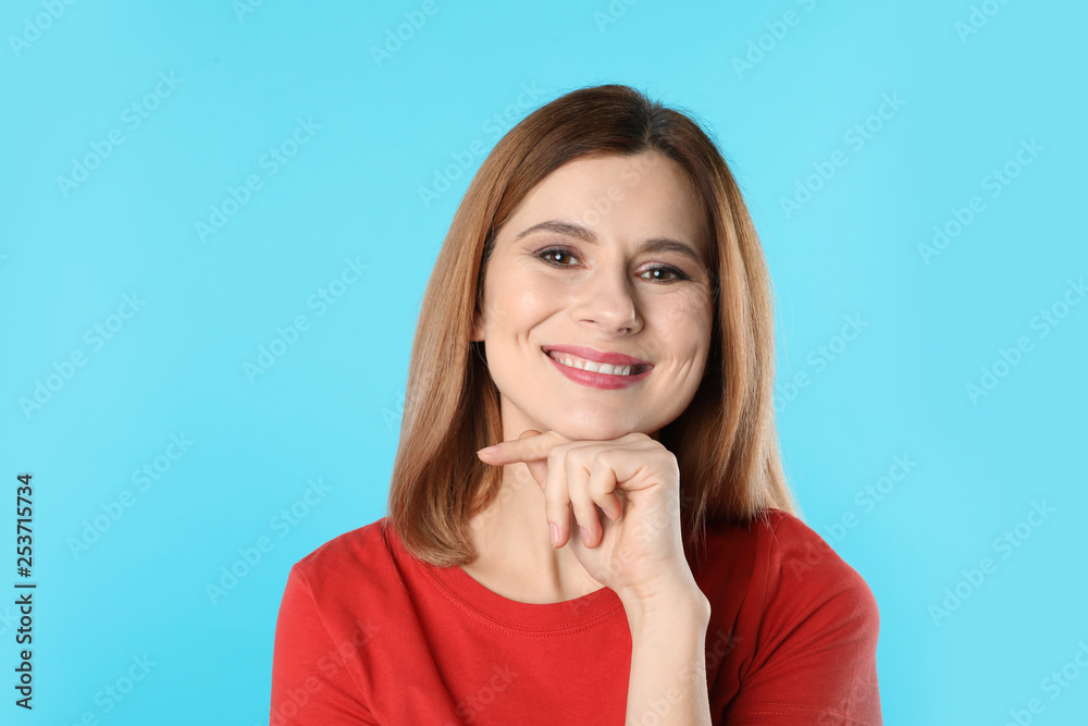 Smiling woman with perfect teeth on color background Smiling woman with perfect teeth on color background