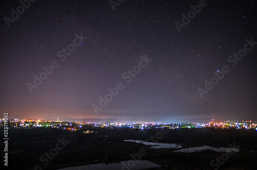 Night city on a background of stars