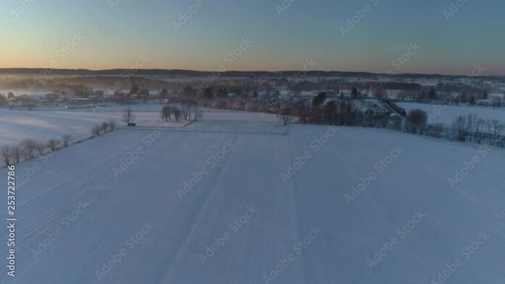 Aerial View of Early Morning Sunrise After a Snow Fall in Amish Countryside as Senn by s Drone Aerial View of Early Morning Sunrise After a Snow Fall in Amish Countryside as Senn by s Drone