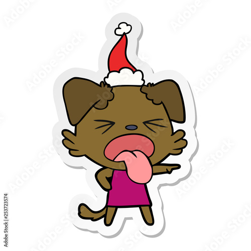 sticker cartoon of a disgusted dog wearing santa hat
