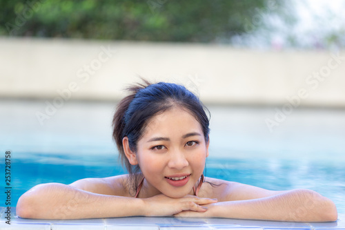 Cute girl in the pool