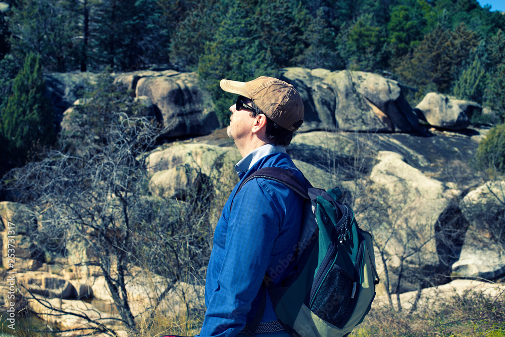 mature active hiker with backpack enjoy the nature mature active hiker with backpack enjoy the nature