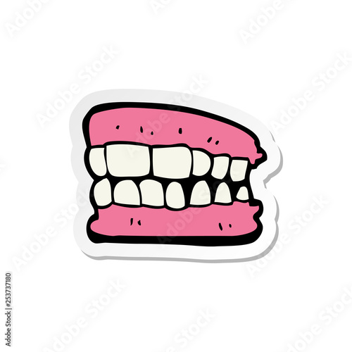 sticker of a cartoon false teeth