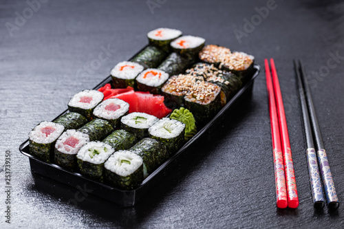 Maki tightly placed into take-out container
