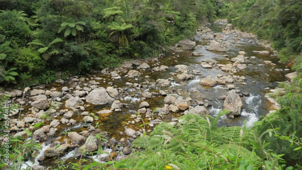slow pan right high angle above pristine clear Waitawheta river in New Zealand slow pan right high angle above pristine clear Waitawheta river in New Zealand