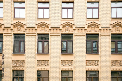  windows and details on an exterior of the building.