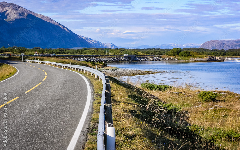 The road running along the coast of the Norwegian fjord