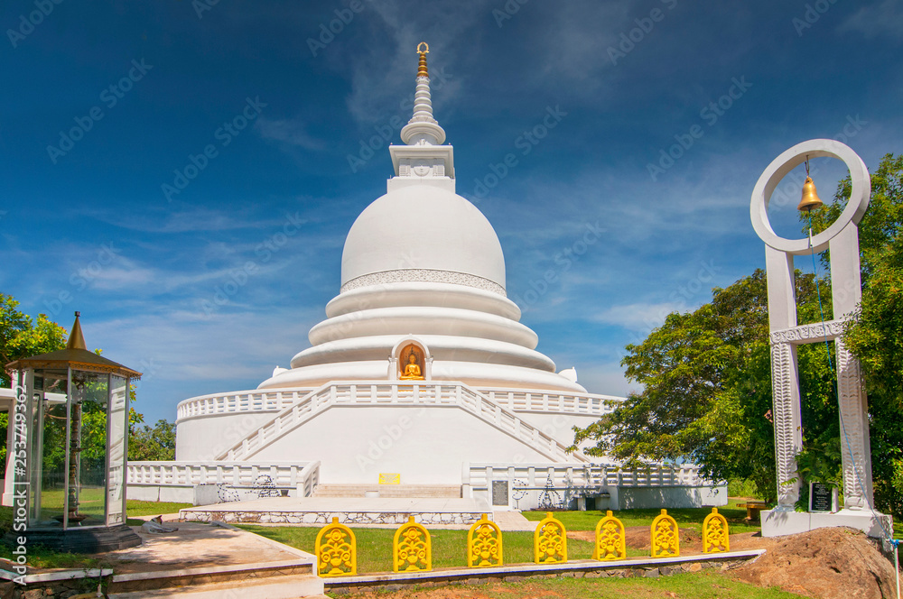 Japanese Peace Pagoda In Rumassala, Sri Lanka. The Japanese Peace Pagoda Near Unawatuna Is A Beautiful Shrine With Amazing Views Across Indian Ocean And Galle Dutch Fort. Japanese Peace Pagoda In Rumassala, Sri Lanka. The Japanese Peace Pagoda Near Unawatuna Is A Beautiful Shrine With Amazing Views Across Indian Ocean And Galle Dutch Fort.
