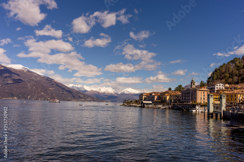 Italy  Bellagio  Lake Como  Varenna  BUILDINGS AT WATERFRONT AGAINST CLOUDY SKY