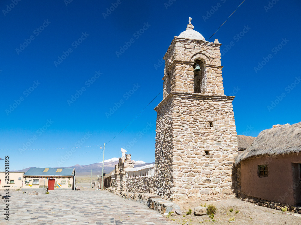 Stone church of the village of Sajama. The small Andean town of Sajama, Bolivian Altiplano. South America