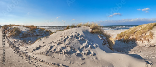 Bike path and pedestrian entrance to the beach in Hiddensee island, Baltic See in Germany, panorama
