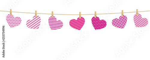 patterned hearts hang on a rope with clothespins vector illustration EPS10