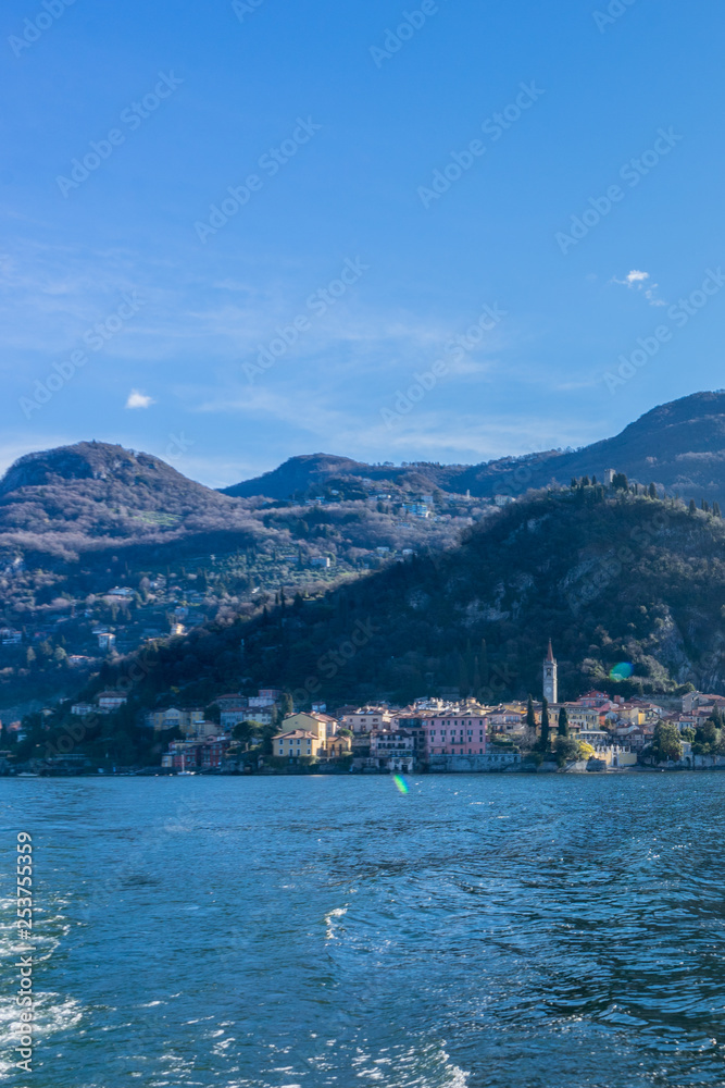 Italy, Bellagio, Lake Como view of village Varenna from boat