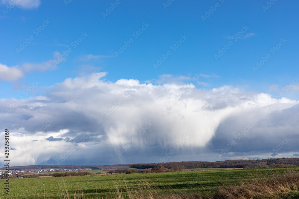 Green fields and blue skies over hessen in Germany Green fields and blue skies over hessen in Germany