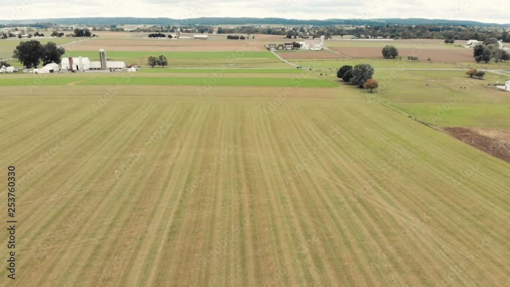 Aerial Flyover freshly cut grass field Pennsylvania Farm patch. Aerial Flyover freshly cut grass field Pennsylvania Farm patch.