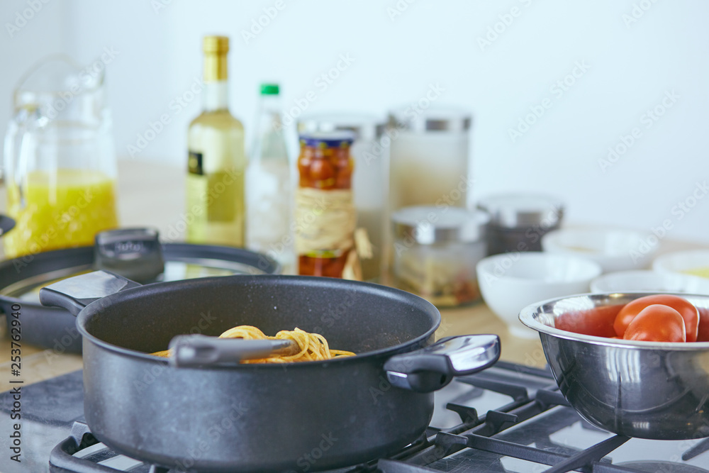 Composition with wooden board and ingredients for cooking on table Composition with wooden board and ingredients for cooking on table