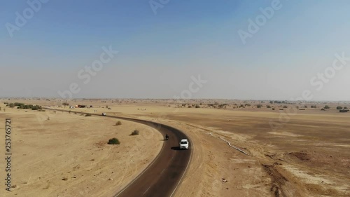 AERIAL Cars Driving in Desert photo