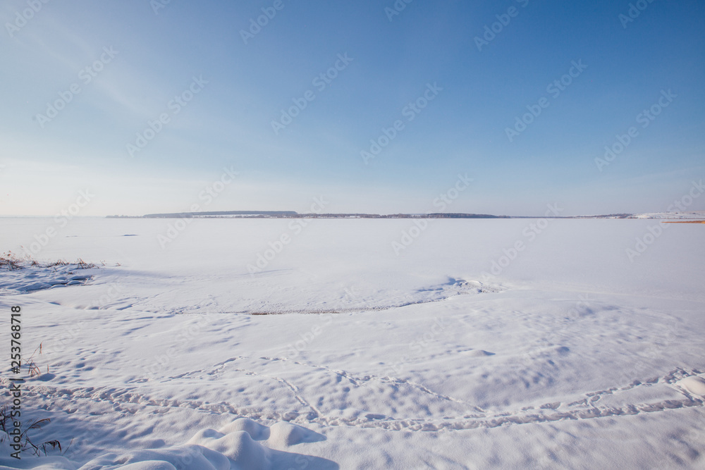 frozen reservoir in the snow