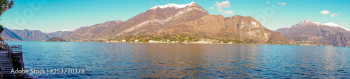 Fototapeta Naklejka Na Ścianę i Meble -  Italy, Bellagio, Lake Como, Cadenabbia, SCENIC VIEW OF SEA BY MOUNTAINS AGAINST SKY