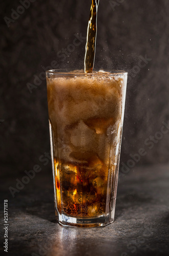 Wallpaper Mural Glass of coke with ice on a dark background. Carbonated beverages. Selective fokus. Torontodigital.ca