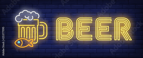 Beer neon sign. Beer mug with snack