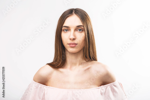 Beautiful woman face close up studio on white background