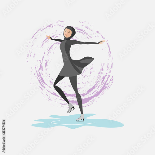 girl in hijab figure skating on ice rink. Ice skating.
