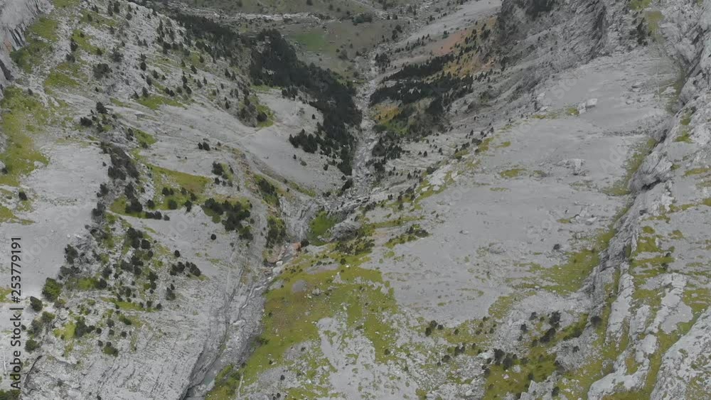 Aerial top view of a massive canyon over Monte Perdido National Park in Spain. Aerial top view of a massive canyon over Monte Perdido National Park in Spain.