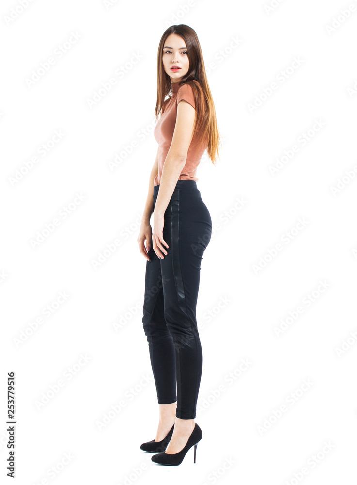 Full body, Young beautiful brunette woman in black pants Full body, Young beautiful brunette woman in black pants