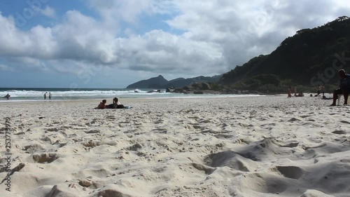 People chill and relax on Praia de Lopez Mendes on Ilha Grande in Brazil photo