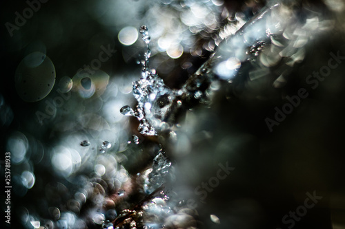 water drops abstract background with lights