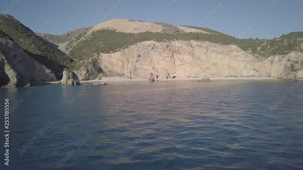 Aerial panoramic view of the beautiful coastline at Sesimbra, Ribeiro de Cavalo Portugal. Drone flying over the ocean towards the beach Aerial panoramic view of the beautiful coastline at Sesimbra, Ribeiro de Cavalo Portugal. Drone flying over the ocean towards the beach