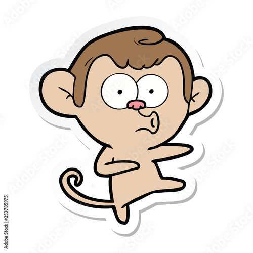 sticker of a cartoon dancing monkey