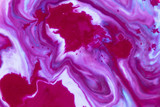 Purple liquid ink swirl abstract background