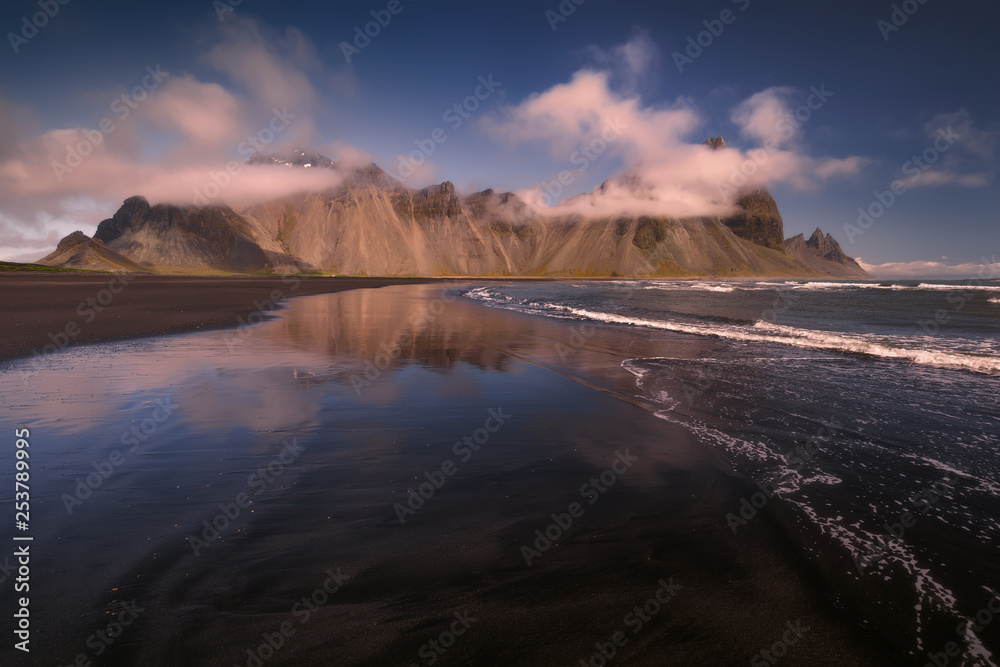 Vestrahorn mount in the South-East of Iceland with Stokksnes black beach