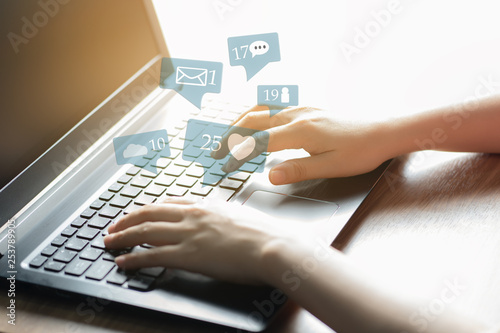 Woman hands using laptop for social media marketing and ecommerce concept.