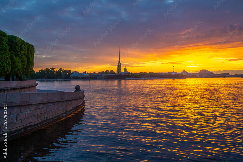 St. Petersburg. Russia. View of the Peter and Paul Fortress from the Spit of Vasilyevsky Island. Petersburg Embankment. Granite balls on Vasilyevsky Island. Sunset on the Neva. Cities of Russia.
