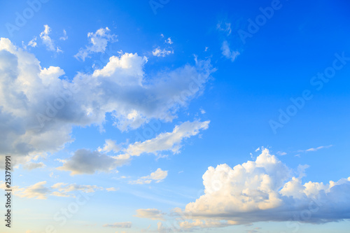 Blue sky background and white clouds in sunny day before sunset with skyspace