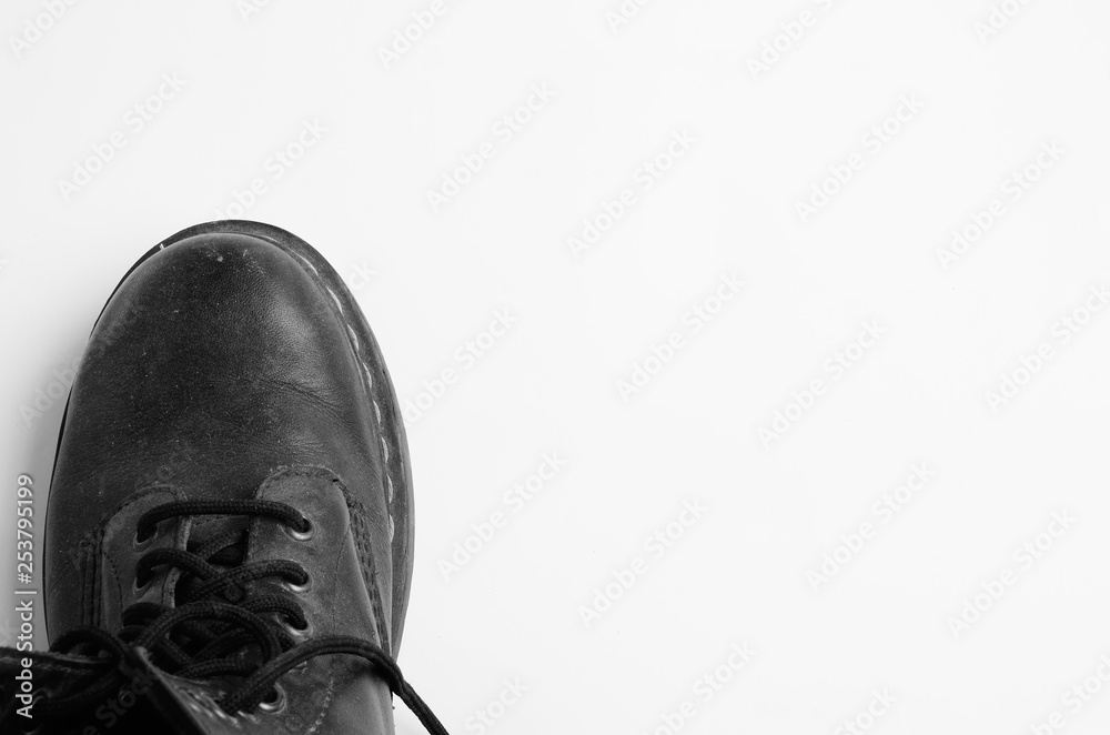 Black leather shoes on white background 