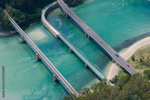  image of three bridges together for cars and trains