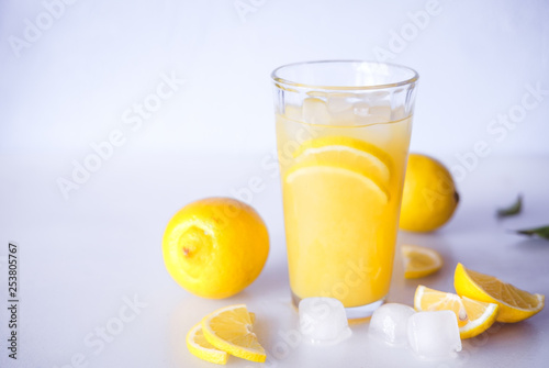 Lemonade. Drink with fresh lemons. Lemon cocktail with juice and ice.