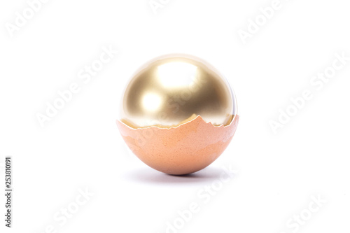 The golden inside egg on white background isolated