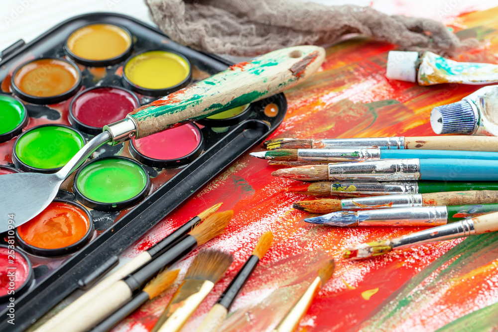 Paint brushes and paints for drawing. Paint brushes and paints for drawing.