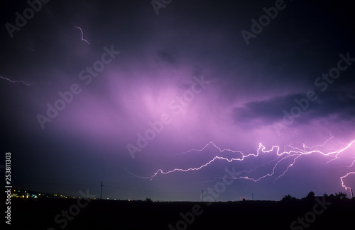 Horizontal lightning bolt over the city of Targu Mures in Transylvania, Romania
