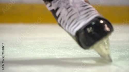 stick hitting hit hockey puck in slow motion