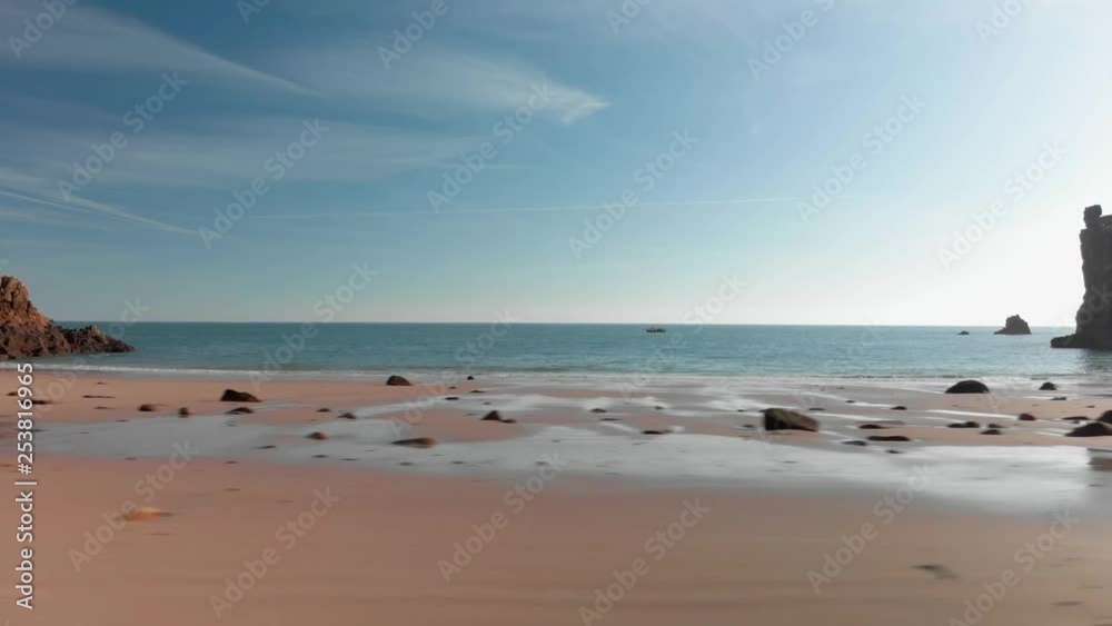 Aerial Shot Above A Sandy Beach With Rocks, Moving From Right To Left Aerial Shot Above A Sandy Beach With Rocks, Moving From Right To Left