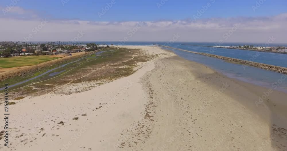 A beautiful aerial view of a sunny beach day. A beautiful aerial view of a sunny beach day.