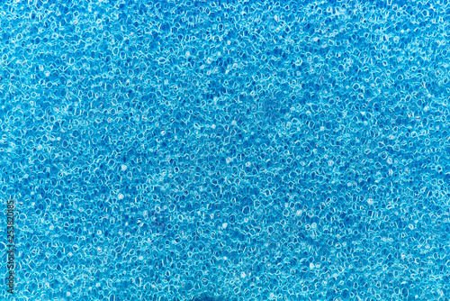 The texture surface of the abrasive synthetic fiber.