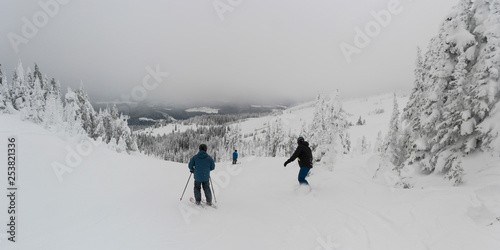 Tourists skiing in Sun Peaks Resort, Sun Peaks, Kamloops, British Columbia, Canada